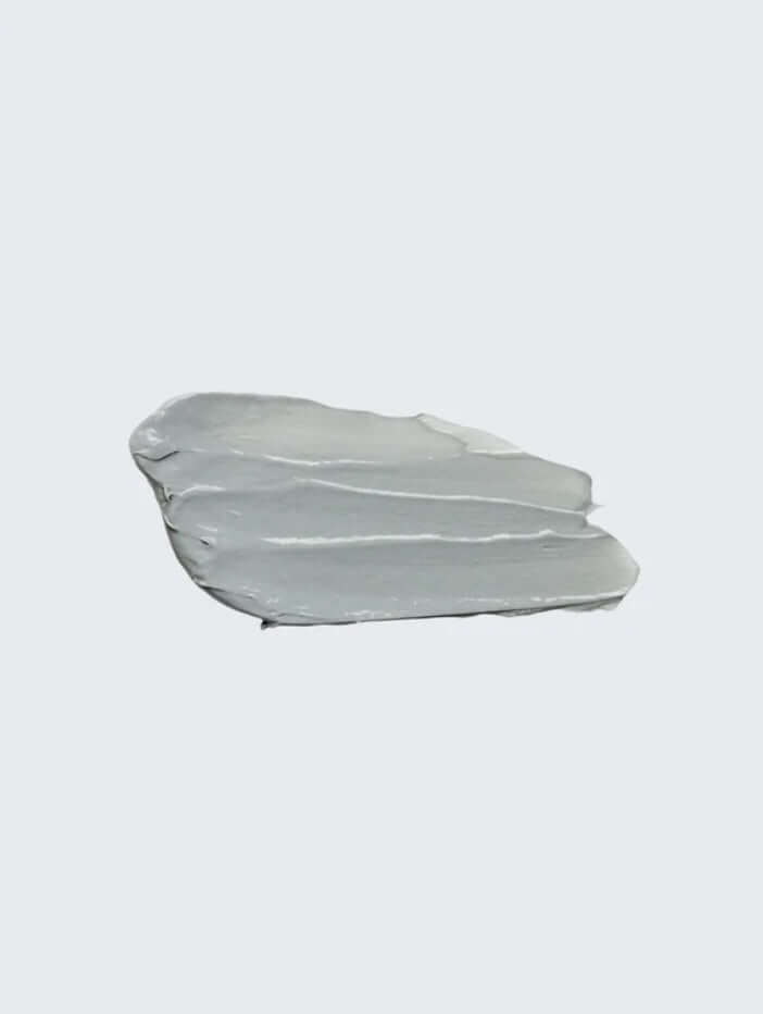 Smooth gray serum texture for acne treatment, showcasing its calming and antibacterial properties.