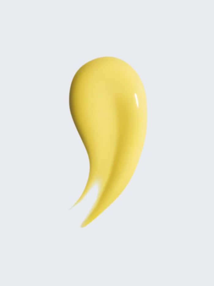 Sérum L'Éclaté en texture jaune, léger et illuminant pour un teint uni et éclatant.